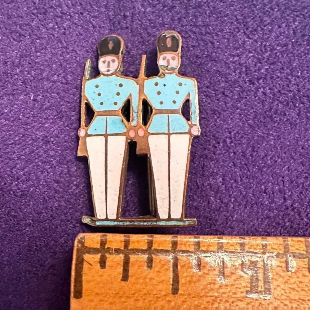 Vintage enamel on gold tone metal soldiers pin brooch